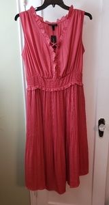 Salmon silk-like midi dress. Ruffle front. Pleated